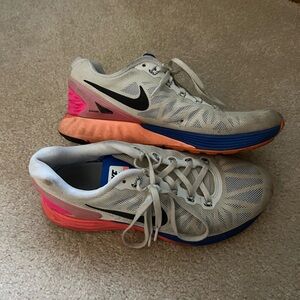 Nike Sneakers with Pink and Blue Highlights